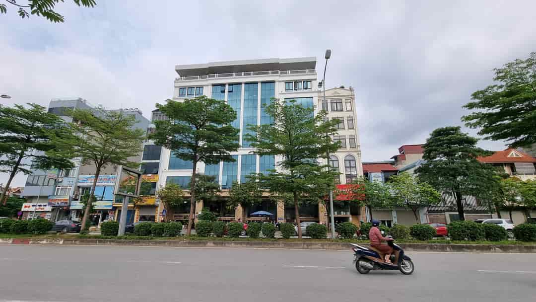 Tin thật 100% Bán tòa VP cao cấp 2 mặt tiền 136m2 x 9T tại mặt phố Trần Vỹ - Cho thuê 2,2 tỷ/năm