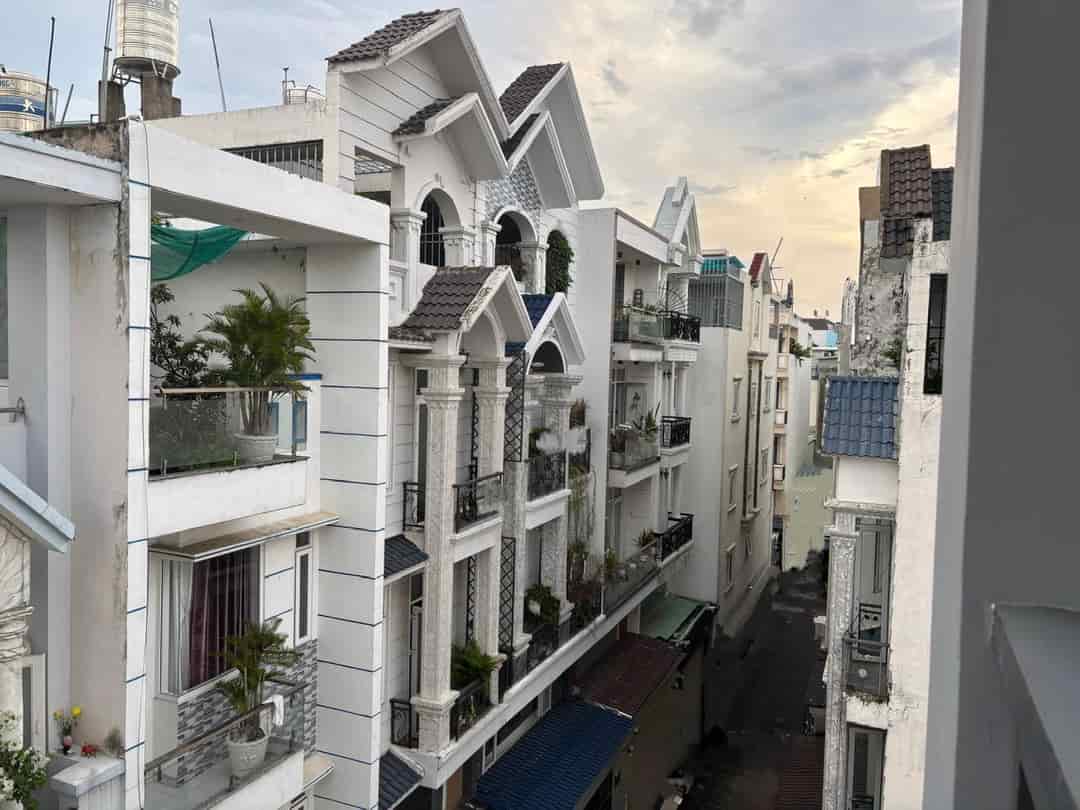 Bán nhà gần chợ hạnh thông tây Gò vấp HXH 172m2 4 tầng khu VIP giá 6.x tỷ