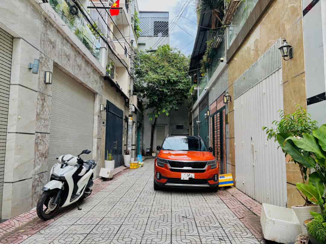 NGAY CHỢ HẠNH THÔNG TÂY GÒ VẤP BÁN NHÀ HXH 222M2 NGANG 4.5m, 4 TẦNG CHỈ 7 TỶ TL